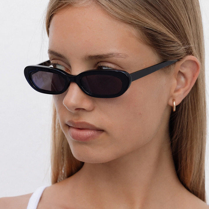 Women's trendy cat-eye sunglasses with transparent plastic frame and UV protection Kalsten