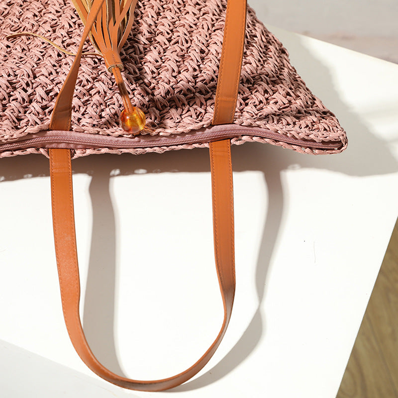 Handcrafted basket bag with fashionable tassel detail Kalsten