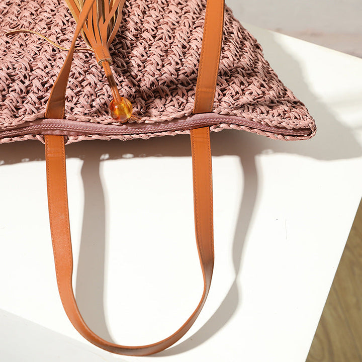 Handcrafted basket bag with fashionable tassel detail Kalsten