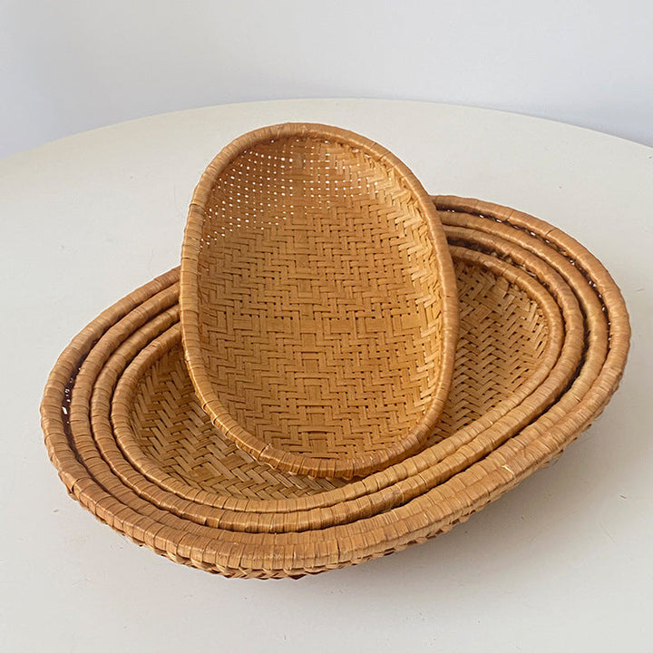 Women oval serving basket made of handwoven natural material Kalsten