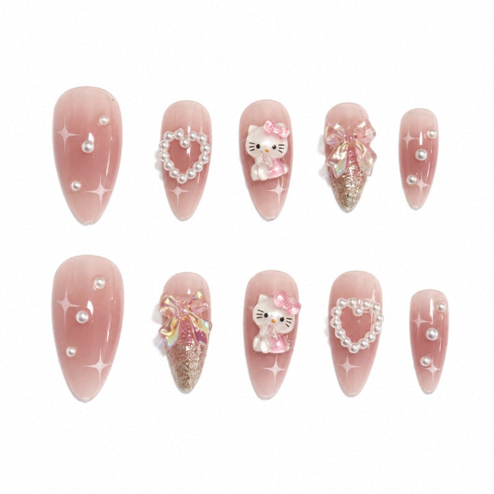 Playful artificial nails with heart and kitty motifs Kalsten