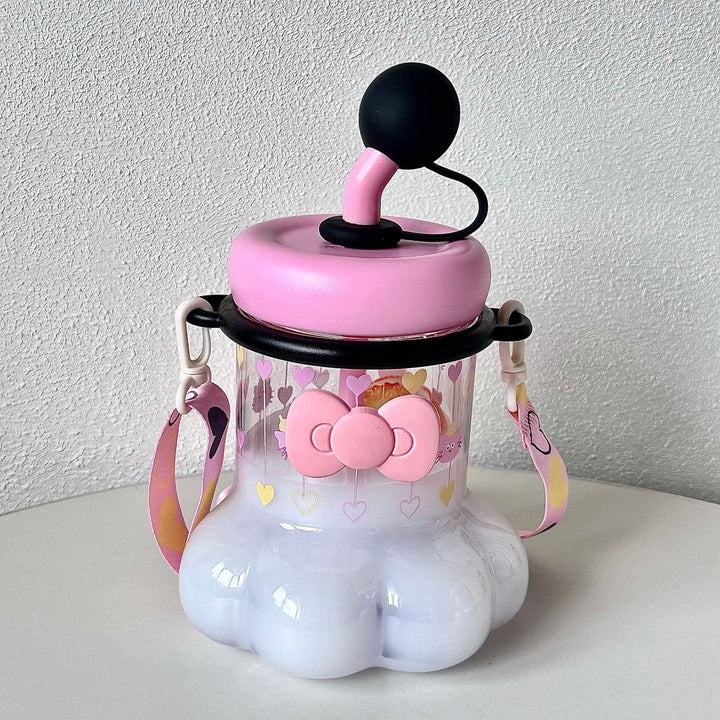 Women's water bottle with integrated silicone carrying handle and playful design Kalsten