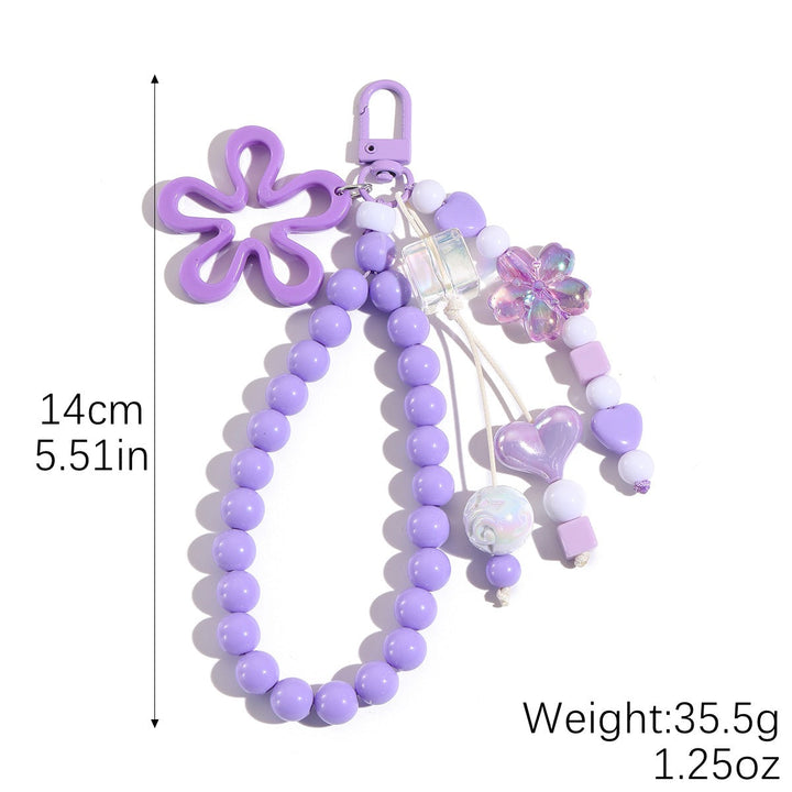 Playful keychain with flower and butterfly details Kalsten