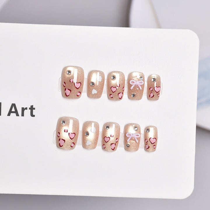 Artistic Press-On Nail Set with Heart and Bow Designs Kalsten