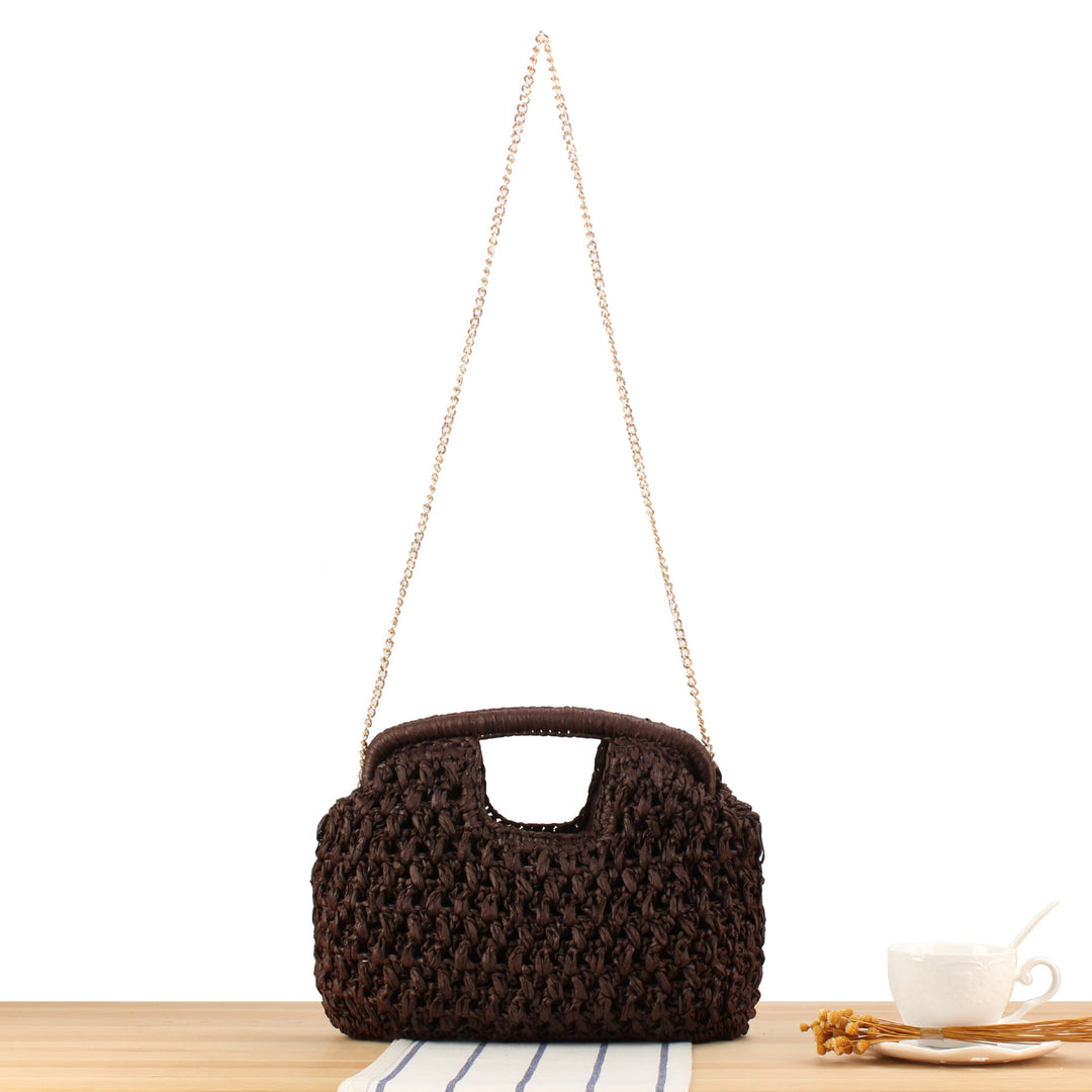 Fine straw shoulder bag with elegant chain accents Kalsten