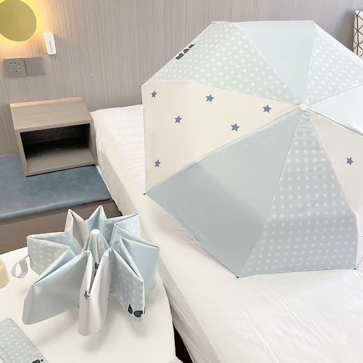 Women's folding umbrella with unique star pattern and practical carrying bag Kalsten
