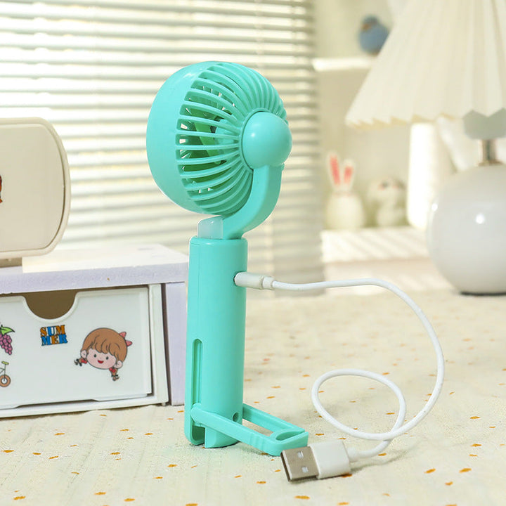 Women portable mini hand fan with integrated LED lighting and USB charging function Kalsten
