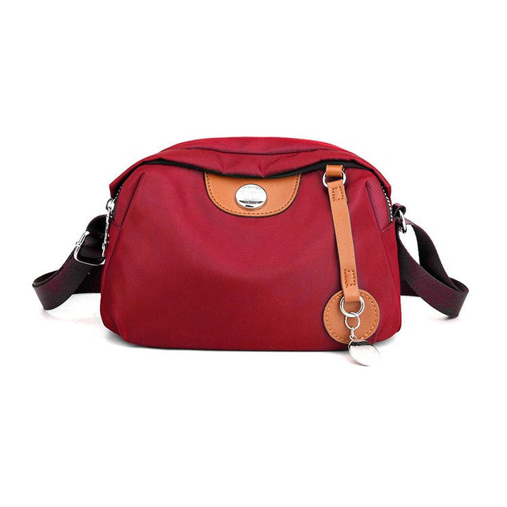 Shoulder bag with adjustable shoulder strap and clear compartment system Kalsten