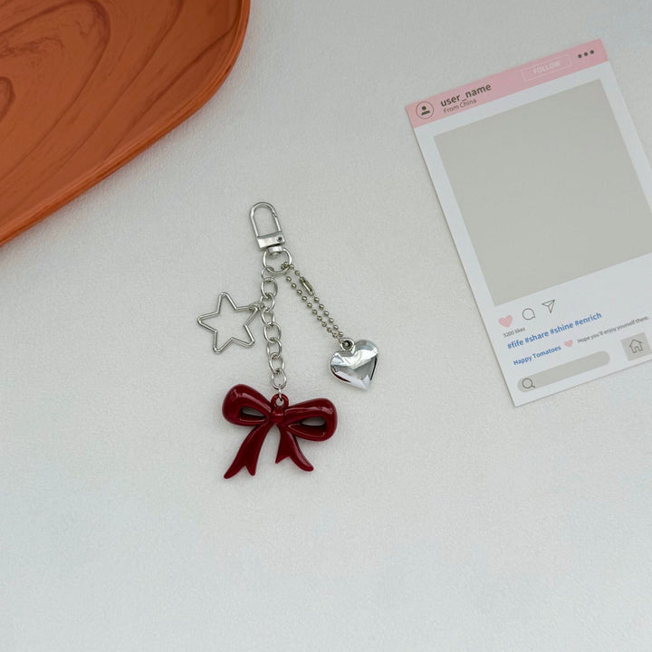 Playful Bow and Star Keychain Kalsten