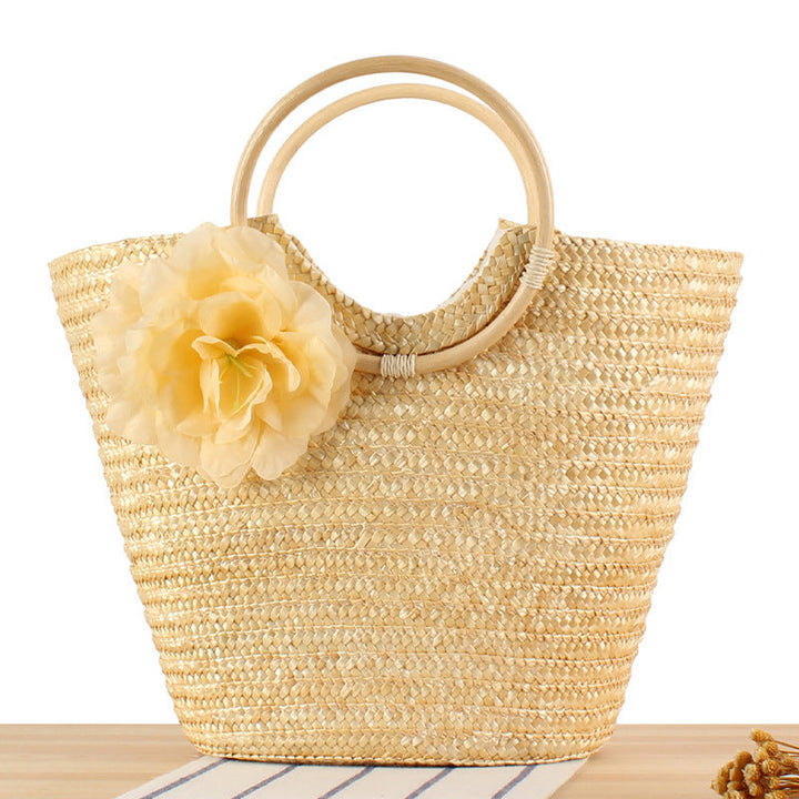 Braided straw bag with floral accent Kalsten
