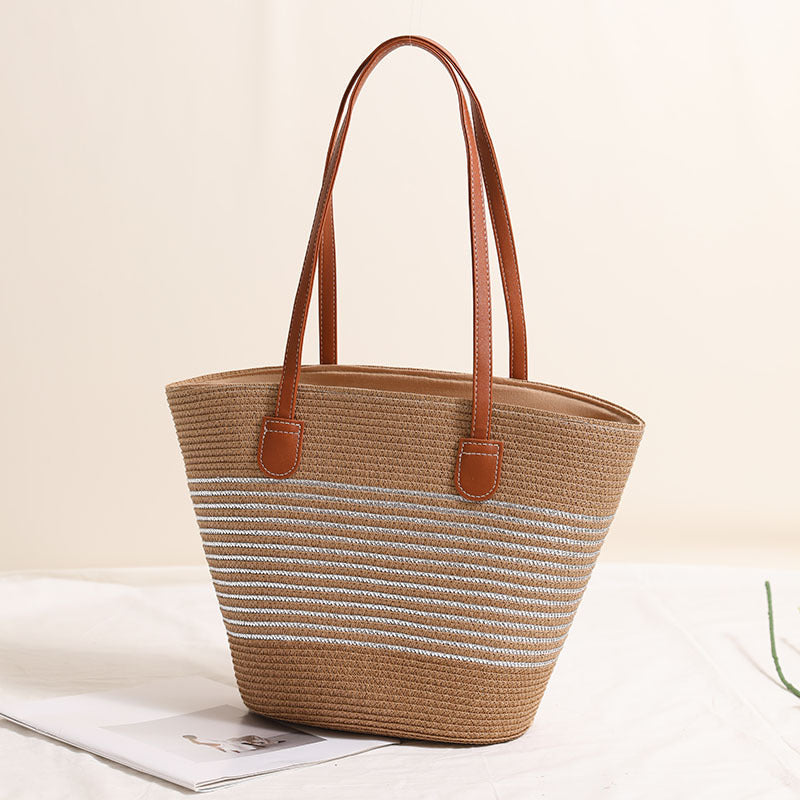 Elegant bast handbag with leather accents Kalsten