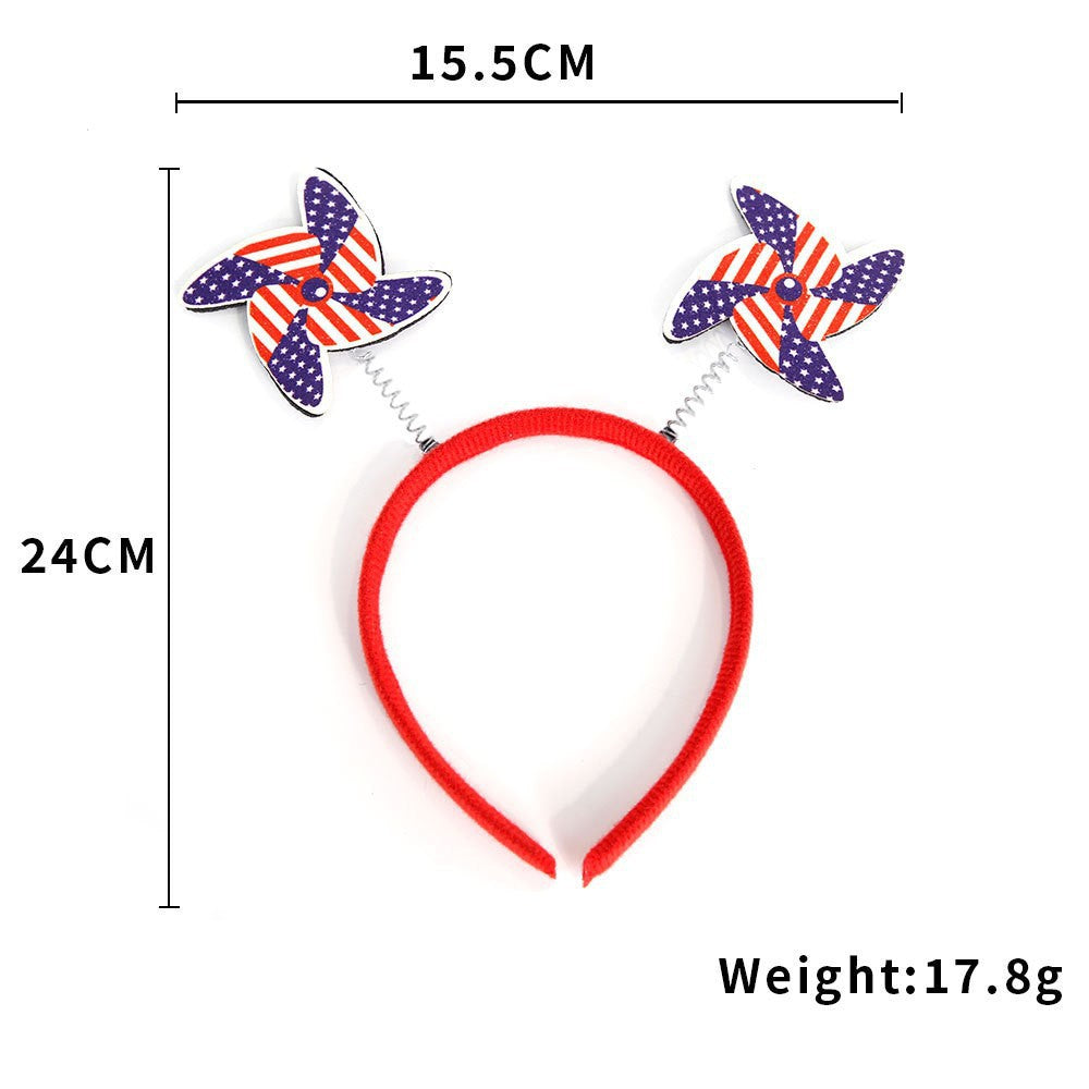Unisex nan eye-catching party headband with attached pom poms, star tinsel, and small flag pendants Kalsten