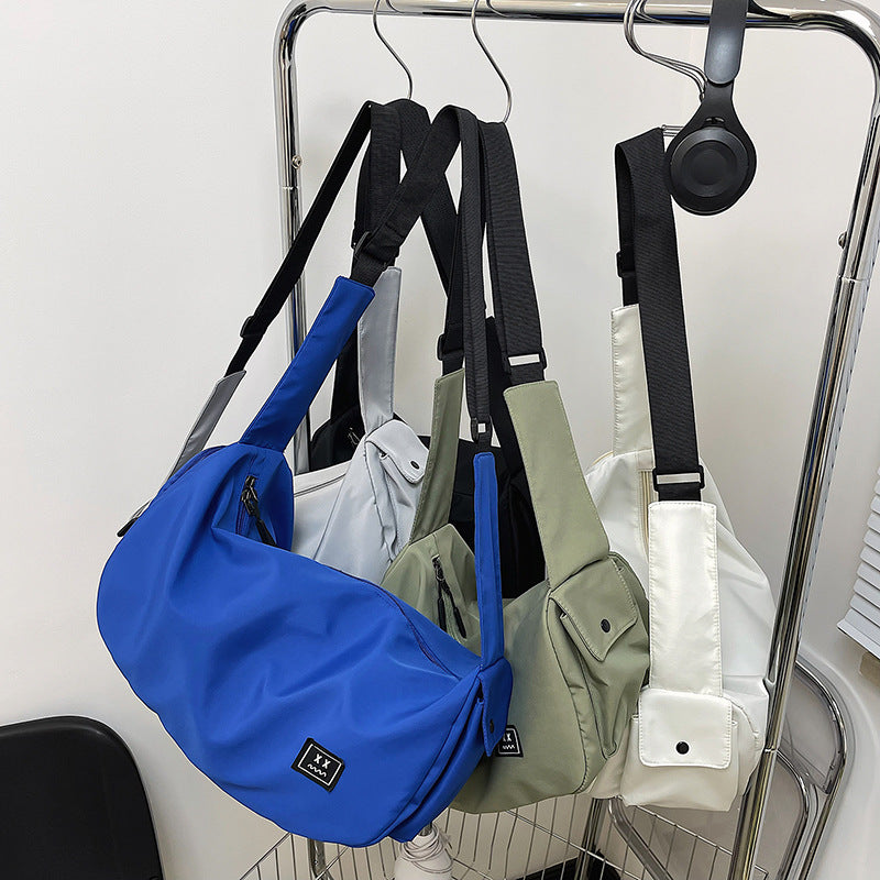 Sporty shoulder bag with adjustable carrying strap Kalsten