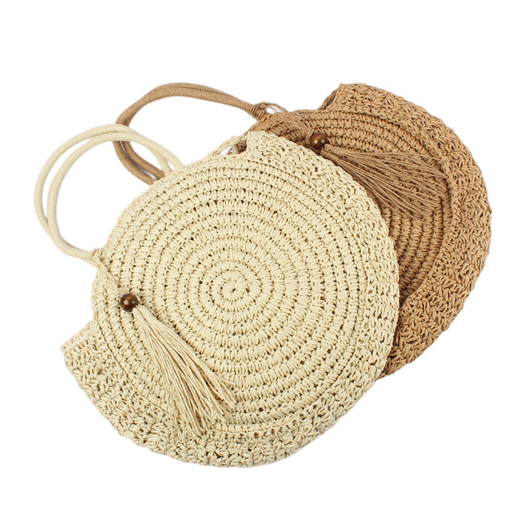 Round basket bag with elegant tassel Kalsten