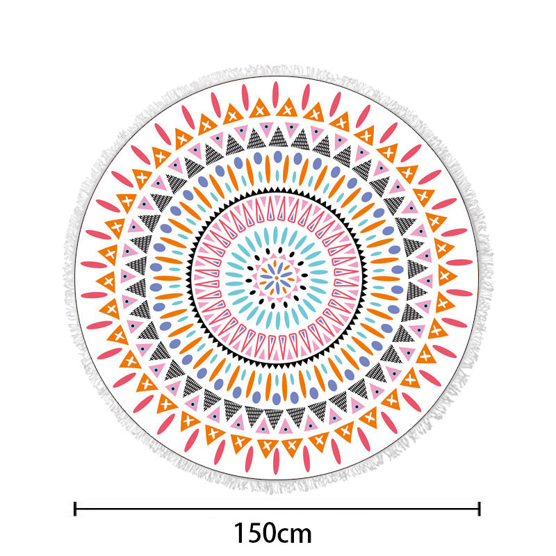 Round beach towel with colorful, tropical floral pattern and fringe decoration Kalsten