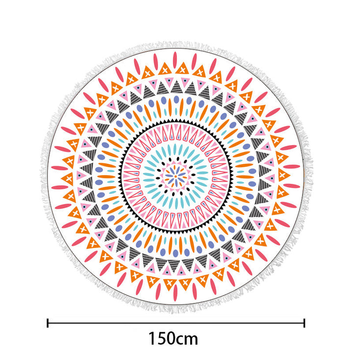 Round beach towel with colorful, tropical floral pattern and fringe decoration Kalsten