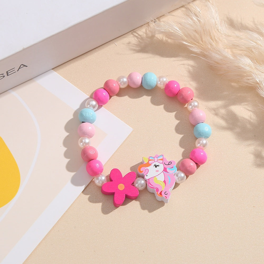 Playful children's bracelet with unicorn and flower motif Kalsten
