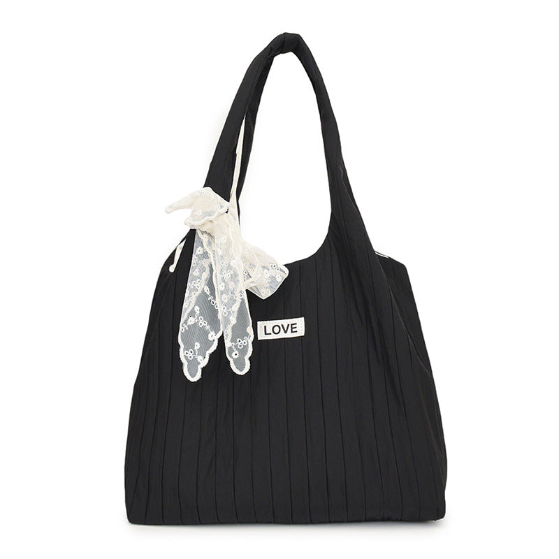 Leisure bag with structured design and playful scarf Kalsten