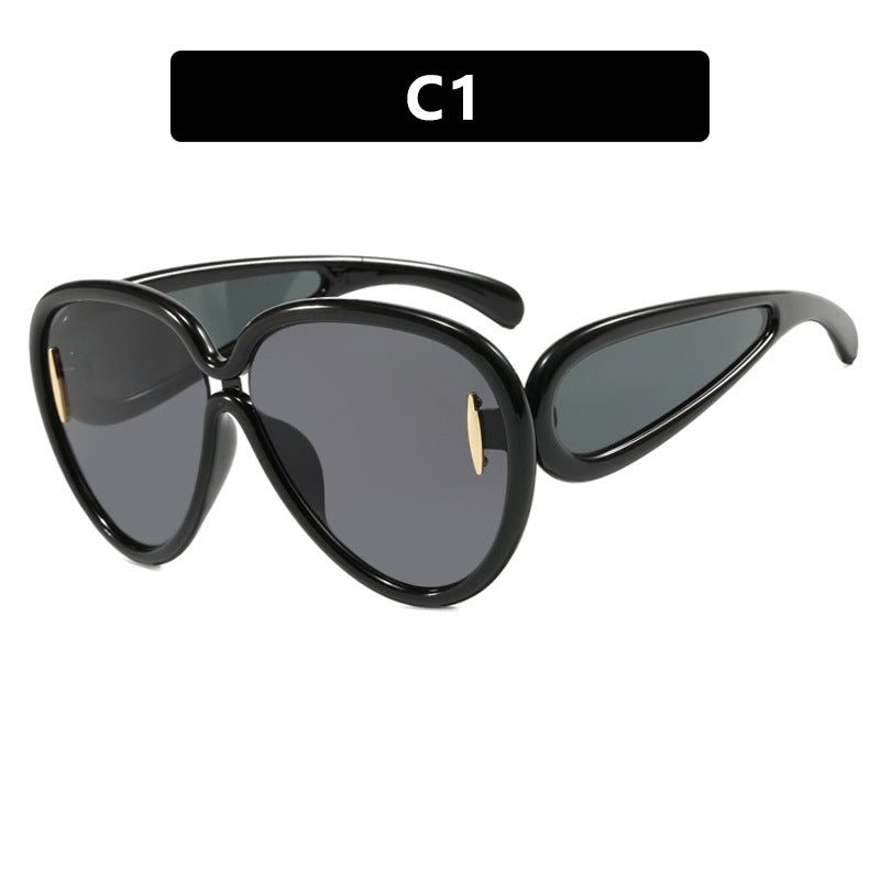 Women extravagant sunglasses in creative design Kalsten