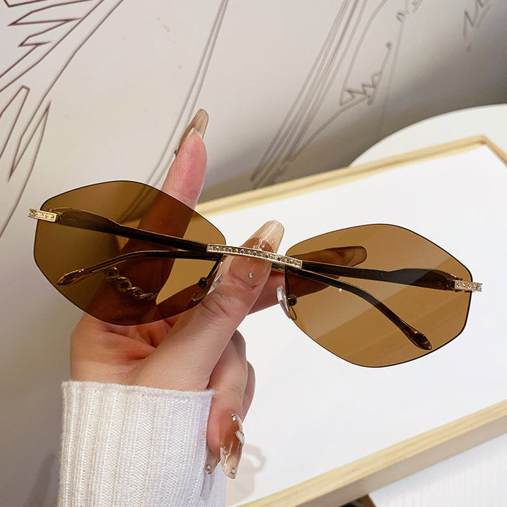 Women's extravagant sunglasses with sparkling accents Kalsten