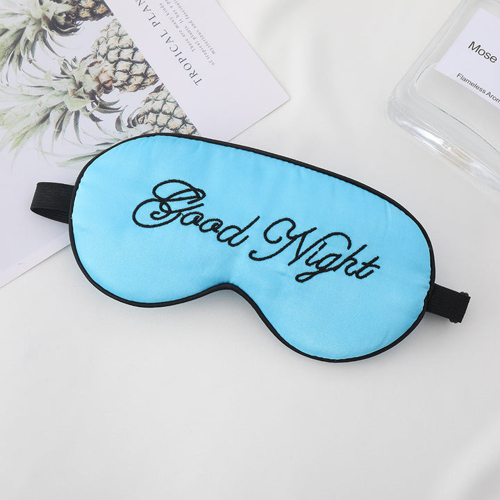 Unisex embroidered contoured sleep mask with decorative text embroidery and adjustable elastic band Kalsten