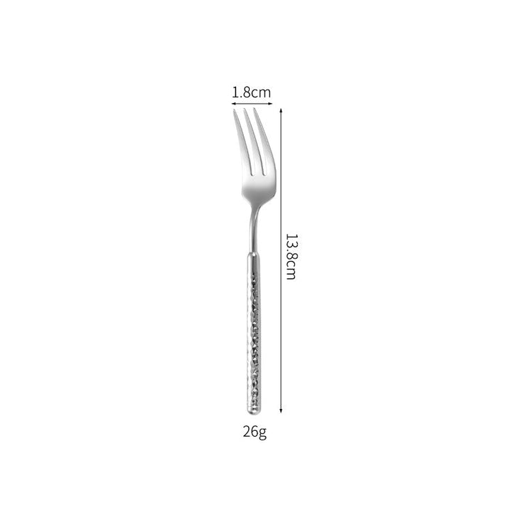Elegant dessert spoon with elaborate handle design Kalsten