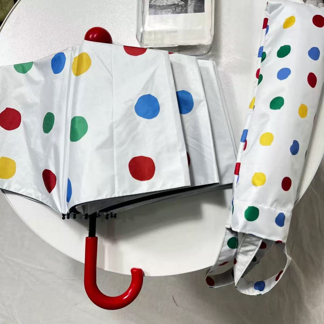 Ladies designer foldable umbrella with colorful polka dot pattern Kalsten