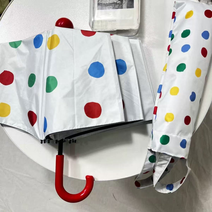 Ladies designer foldable umbrella with colorful polka dot pattern Kalsten