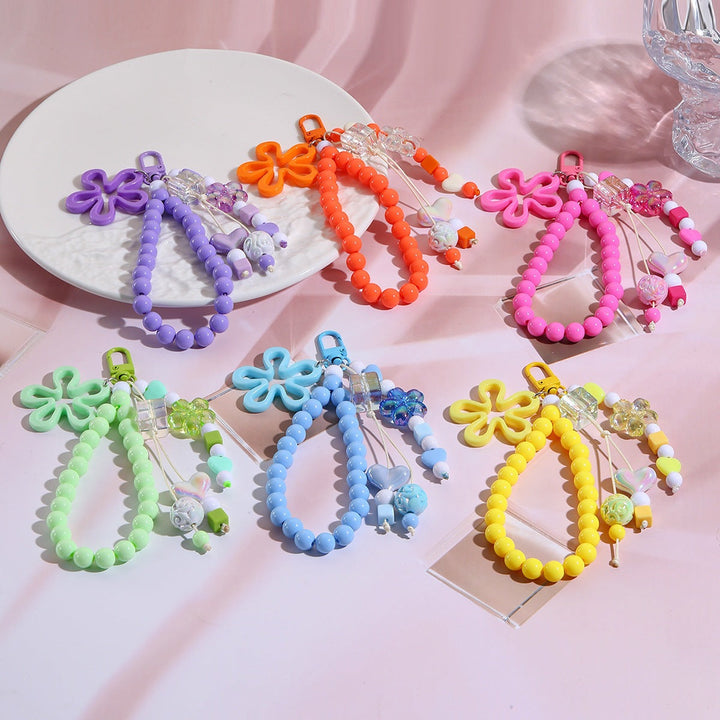 Playful keychain with flower and butterfly details Kalsten