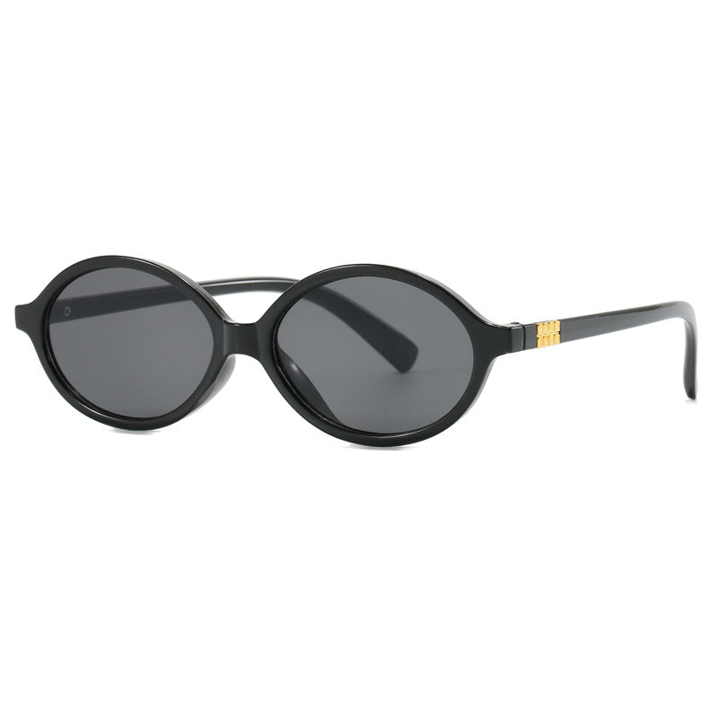 Women's fashionable sunglasses with oval frame and golden accents Kalsten