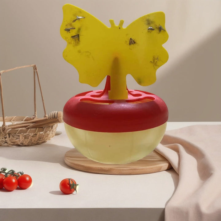 Butterfly-shaped sticky insect trap with refillable liquid reservoir and reusable base Kalsten
