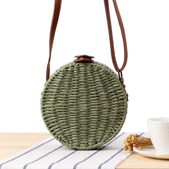 Round basket bag with leather accents Kalsten
