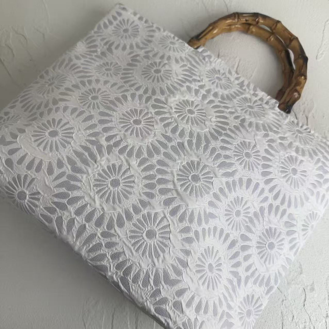 Exclusive and handcrafted beach bag with bamboo handles Kalsten