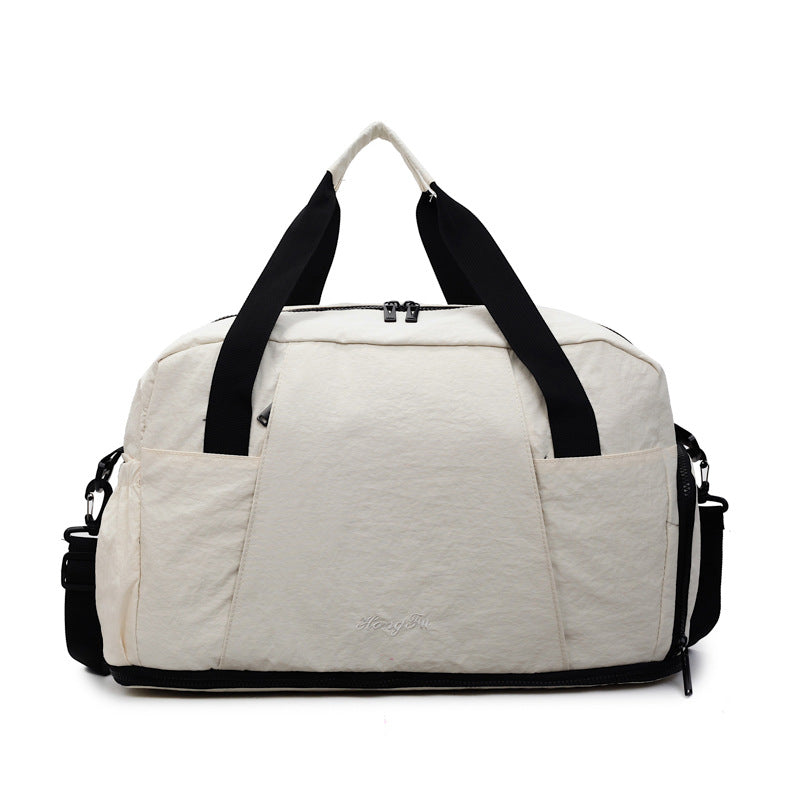 Sporty travel bag with practical outer pockets Kalsten