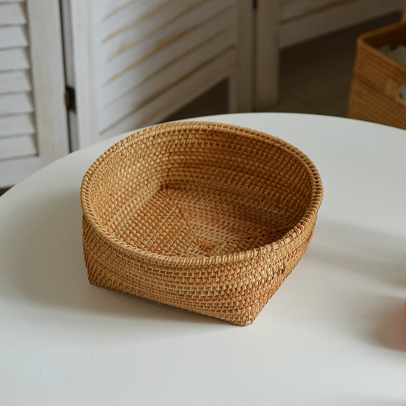 Handcrafted storage basket made of natural rattan Acalora