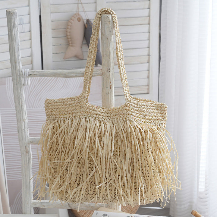 Trendy raffia bag with fringed details Kalsten