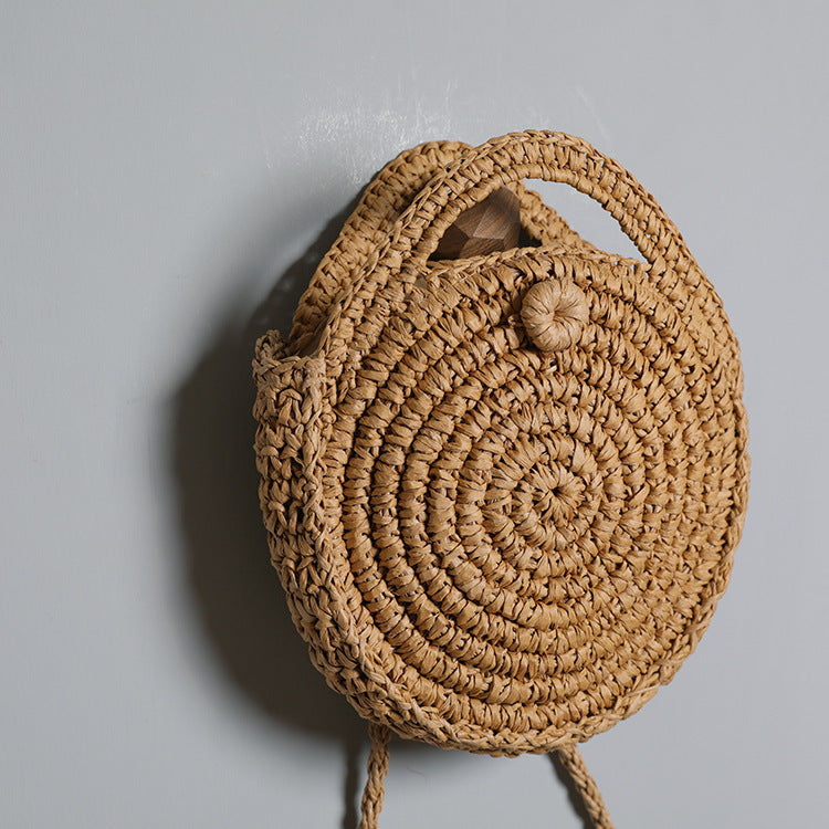 Handcrafted Round Wicker Bag with Elegant Closure Kalsten