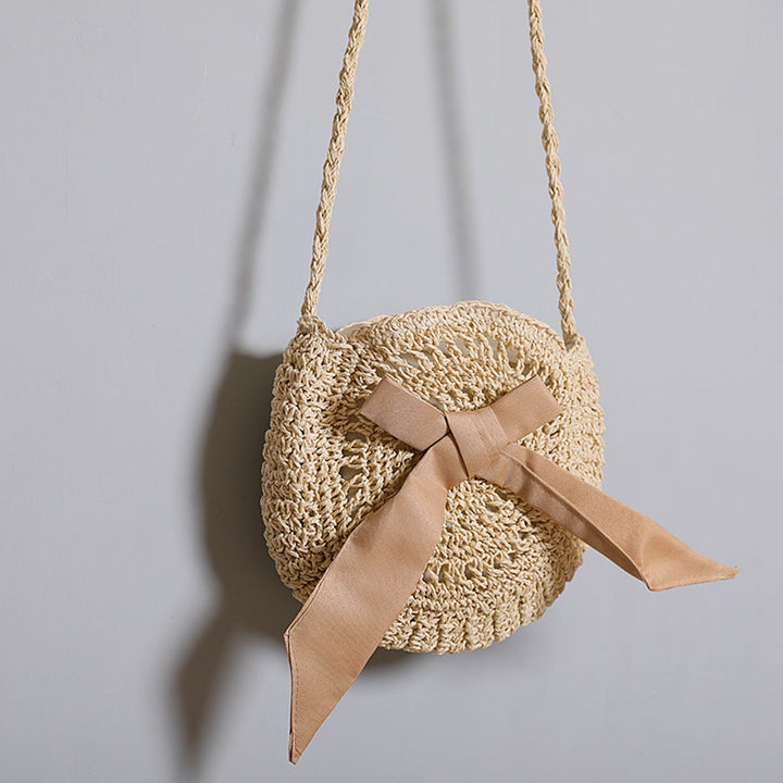 Handwoven shoulder bag with decorative bow accent Kalsten