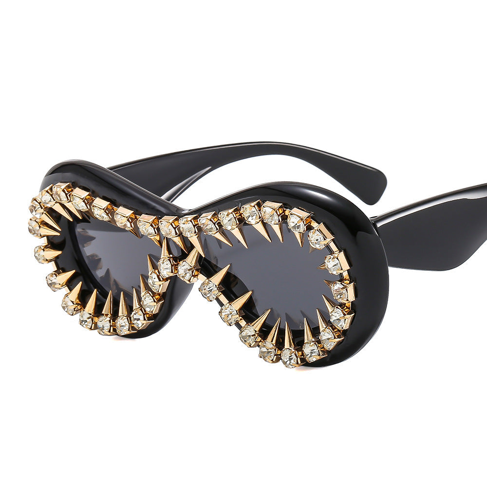 Women's fashionable sunglasses with extravagant spikes and crystal embellishments Kalsten
