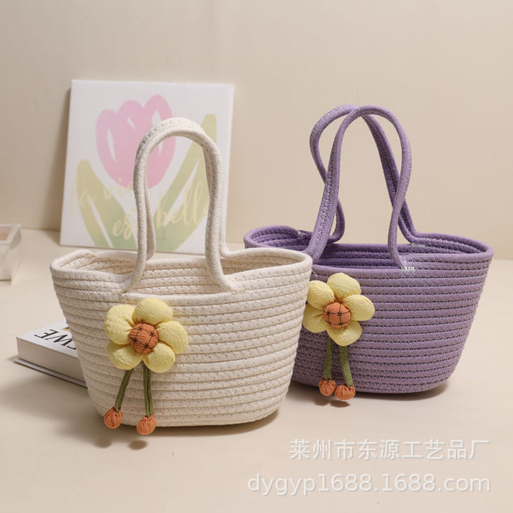 Handcrafted basket bag with floral accents Kalsten