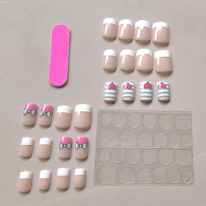 Artificial nails with playful heart and bow pattern Kalsten