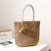 Handmade straw bag with pompom details Kalsten
