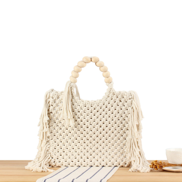 Creative crochet handbag with decorative fringes Kalsten