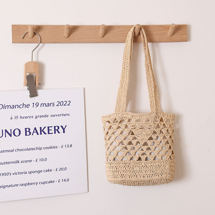 Handcrafted net straw bag with elegant straps Kalsten