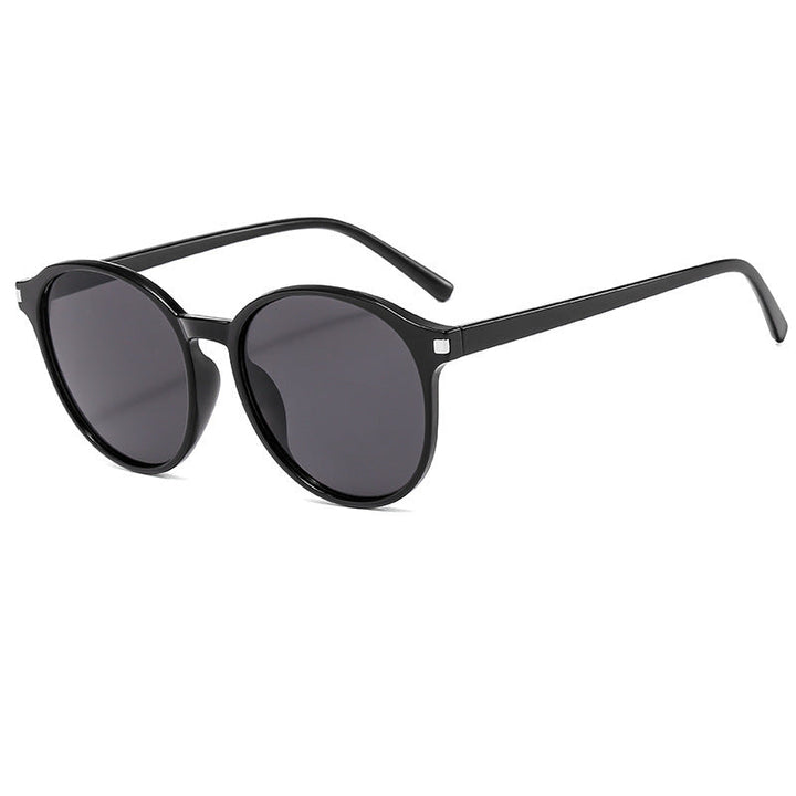Women's retro-inspired sunglasses with curved frames and UV protection Kalsten