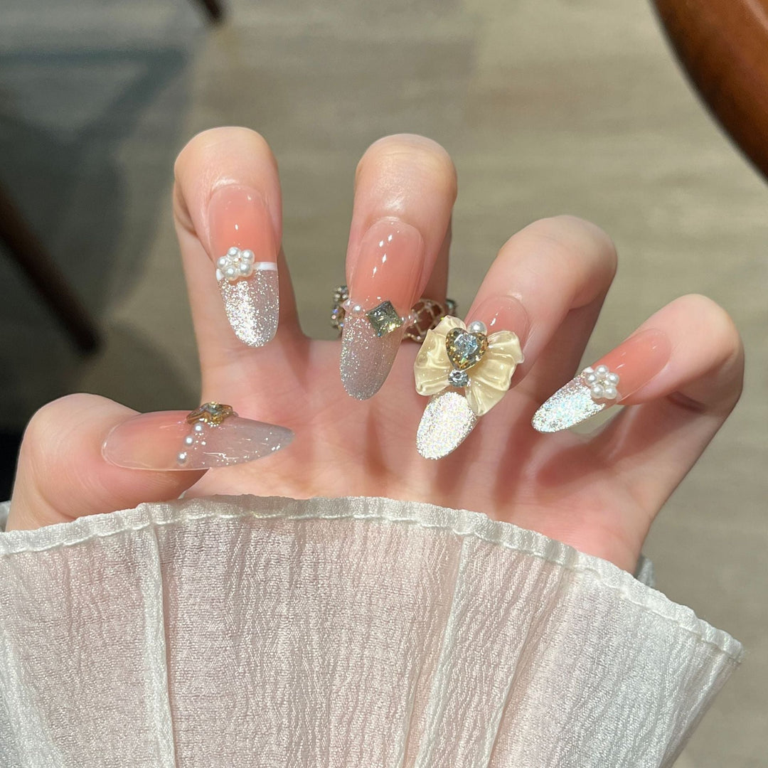 Elegant Nail Art Extensions with Pearl Accents Kalsten