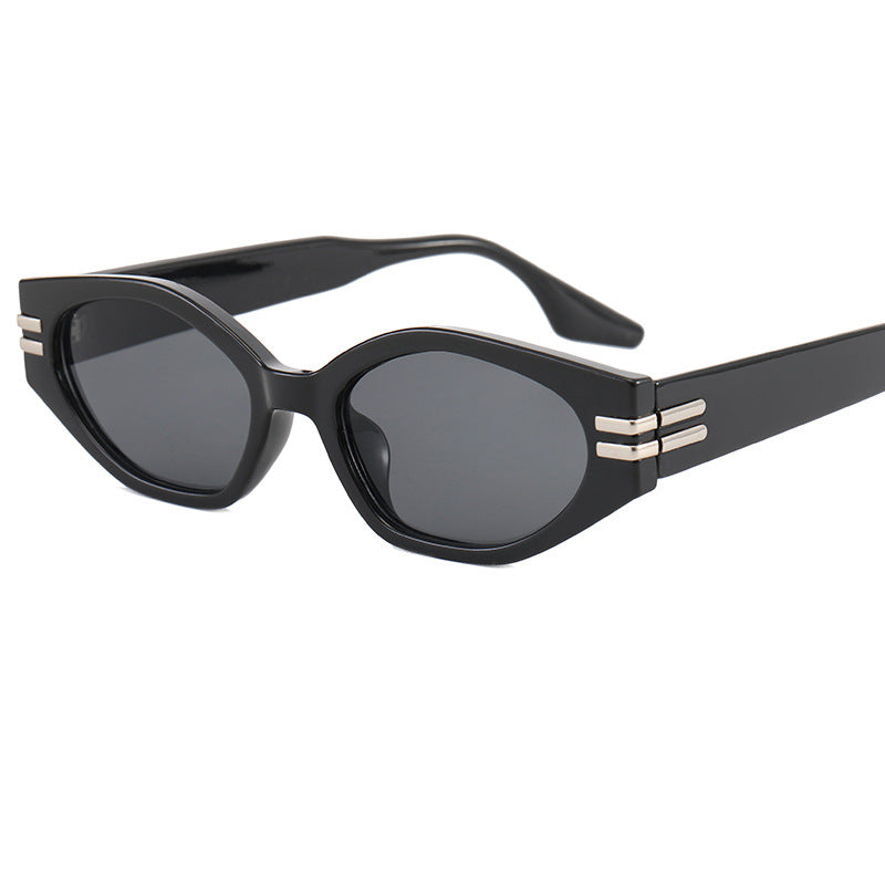 Women striking vintage sunglasses with asymmetric frame Kalsten