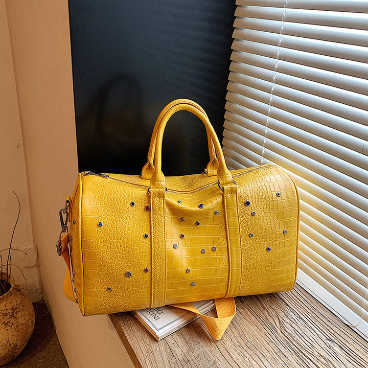 Fashionable travel bag with structured surface and versatile interior Kalsten