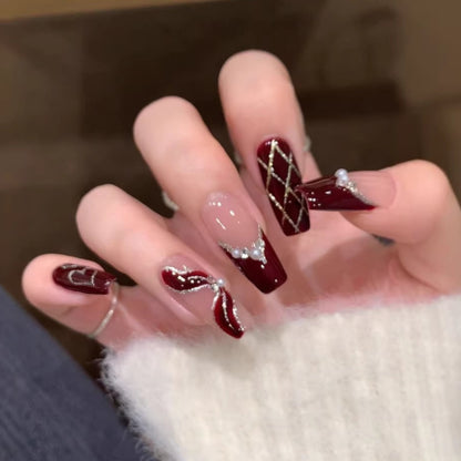 Artificial nails in a playful flower design with glittering accents Acalora