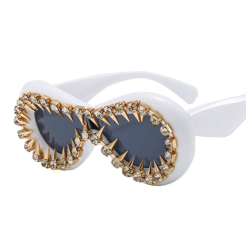 Women's fashionable sunglasses with extravagant spikes and crystal embellishments Kalsten
